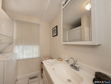 Beautifully maintained 3 bedroom, 2 bath Cape nestled on a quiet - photo 21