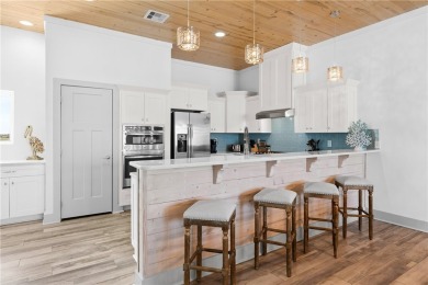 Welcome to coastal luxury living at its finest! This stunning