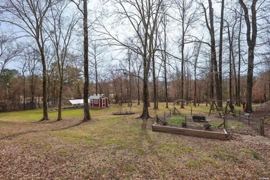 Conveniently located near Lake Greeson and area ATV trails, this - photo 18