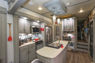 Conveniently located near Lake Greeson and area ATV trails, this - photo 27