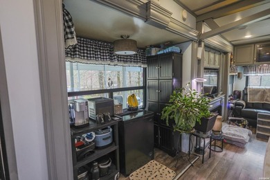 Conveniently located near Lake Greeson and area ATV trails, this - photo 28