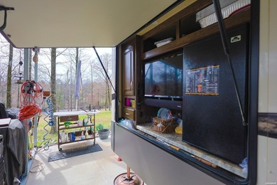Conveniently located near Lake Greeson and area ATV trails, this - photo 31