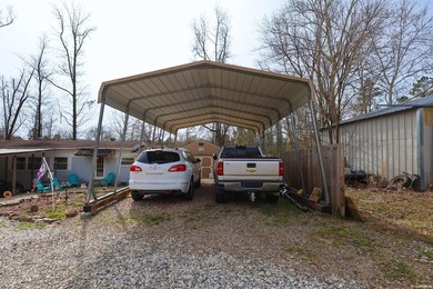 Conveniently located near Lake Greeson and area ATV trails, this - photo 32