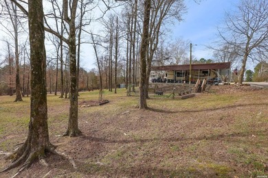Conveniently located near Lake Greeson and area ATV trails, this - photo 34