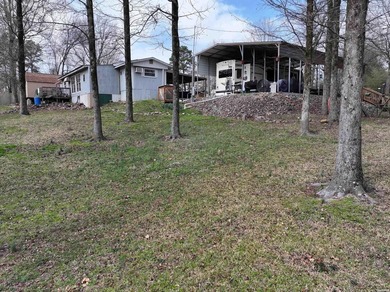 Conveniently located near Lake Greeson and area ATV trails, this - photo 39