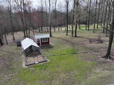 Conveniently located near Lake Greeson and area ATV trails, this - photo 43