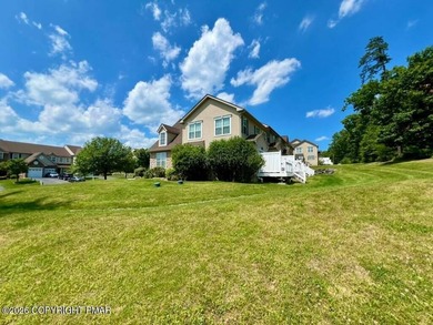 Here's a chance at acquiring a luxury townhome in the highly - photo 2