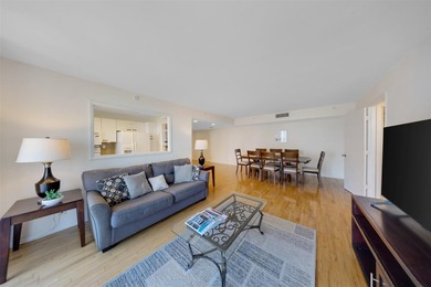 Brand-new floor-to-ceiling impact windows enhance this bright - photo 10