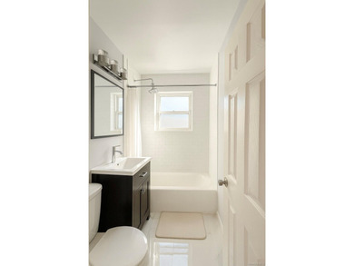 Welcome home to this sun-filled and inviting 2-bedroom residence - photo 9