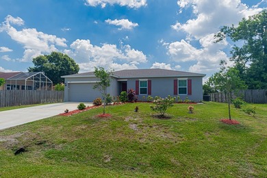 Built in 2023, this 3/2/2 CBS home perfectly combines modern - photo 1