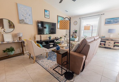 Built in 2023, this 3/2/2 CBS home perfectly combines modern - photo 2