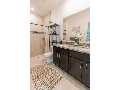 Built in 2023, this 3/2/2 CBS home perfectly combines modern - photo 8