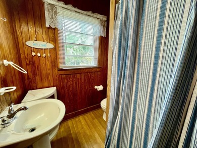 2nd row, ocean views from this classic beach cottage. Relax to - photo 16