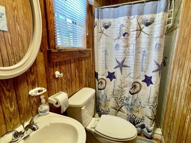 2nd row, ocean views from this classic beach cottage. Relax to - photo 20