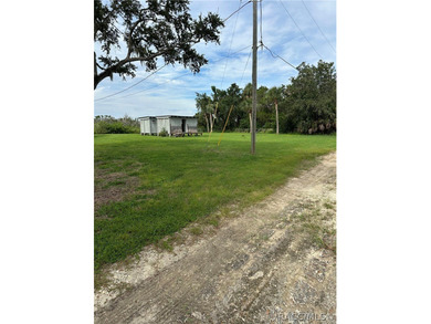 Nestled along the scenic Ozello Trail, this unique waterfront - photo 43