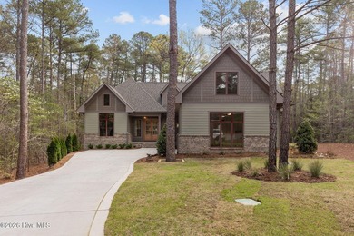 Nestled on a quiet cul-de-sac in Forest Creek Golf Club, this - photo 2