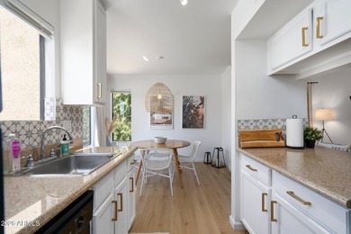 Step into this charming and rare corner unit, now available and - photo 14