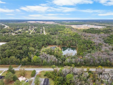 This impressive 3,521 sq. ft. ranch rests on 13.56 acres of - photo 3