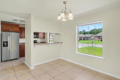 New to the market! This inviting 3-bedroom, 2-bath home offers a - photo 19
