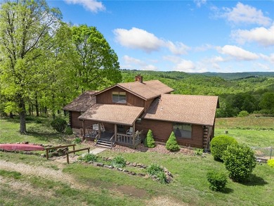 Escape to the beauty of the Ozarks with this stunning 5-bedroom - photo 1