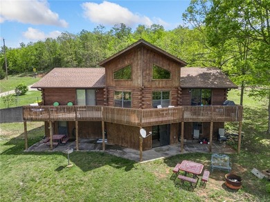 Escape to the beauty of the Ozarks with this stunning 5-bedroom - photo 3