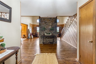 Escape to the beauty of the Ozarks with this stunning 5-bedroom - photo 9