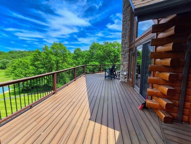 Tucked into a quiet bay with 152 feet of waterfront, this - photo 15