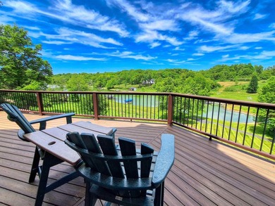 Tucked into a quiet bay with 152 feet of waterfront, this - photo 16