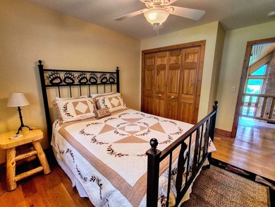 Tucked into a quiet bay with 152 feet of waterfront, this - photo 23