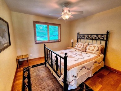 Tucked into a quiet bay with 152 feet of waterfront, this - photo 24