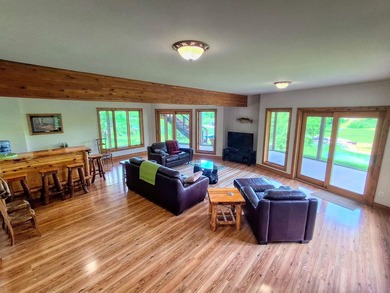 Tucked into a quiet bay with 152 feet of waterfront, this - photo 28