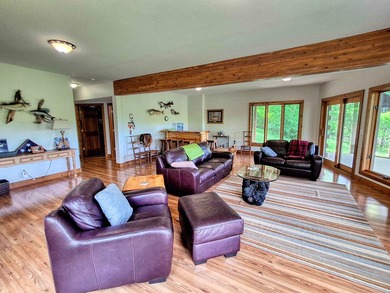 Tucked into a quiet bay with 152 feet of waterfront, this - photo 29