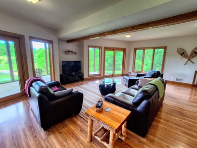 Tucked into a quiet bay with 152 feet of waterfront, this - photo 31