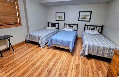 Tucked into a quiet bay with 152 feet of waterfront, this - photo 33