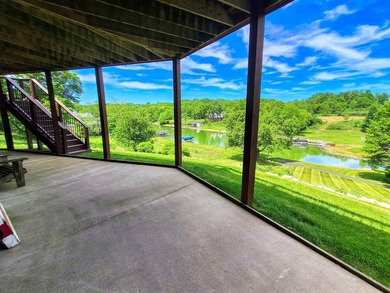 Tucked into a quiet bay with 152 feet of waterfront, this - photo 36