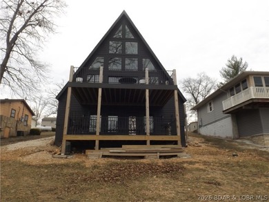 Far from your typical A-frame home, this beautiful 3-bedroom - photo 37