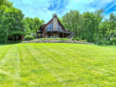 Tucked into a quiet bay with 152 feet of waterfront, this - photo 39
