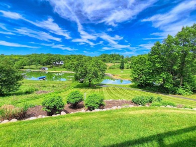 Tucked into a quiet bay with 152 feet of waterfront, this - photo 41