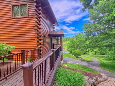 Tucked into a quiet bay with 152 feet of waterfront, this - photo 43