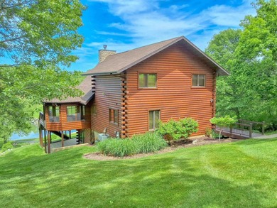 Tucked into a quiet bay with 152 feet of waterfront, this - photo 49