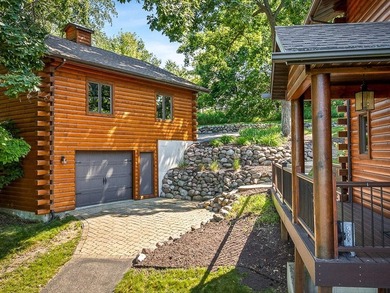 Tucked into a quiet bay with 152 feet of waterfront, this - photo 50