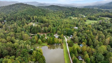 Beautiful setting with scenic views of Coweeta Lake on a full - photo 5