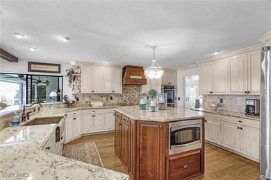 Discover the epitome of riverfront living on ALMOST 1/2 ACRE of - photo 9