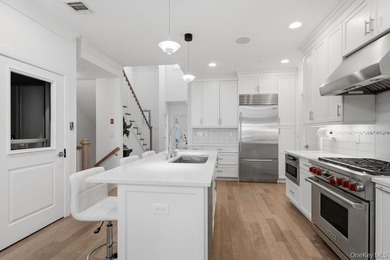 A Fabulous Jamestown Townhouse has a dramatic 2 Story Grand - photo 11