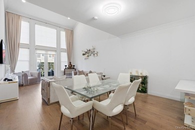 A Fabulous Jamestown Townhouse has a dramatic 2 Story Grand - photo 12