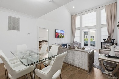 A Fabulous Jamestown Townhouse has a dramatic 2 Story Grand - photo 13