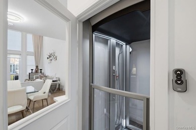 A Fabulous Jamestown Townhouse has a dramatic 2 Story Grand - photo 27