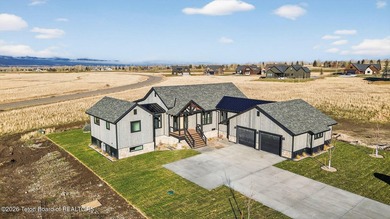 Surrounded by the natural beauty of Teton Valley, this - photo 1