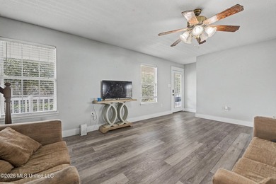 This spacious 4-bedroom, 2 bath home with a bonus room situated - photo 4