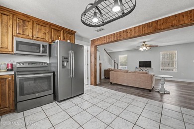 This spacious 4-bedroom, 2 bath home with a bonus room situated - photo 6
